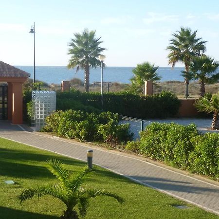 Urbanización Las Arenas Isla Canela Exterior foto